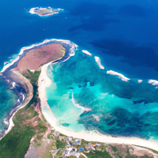 Một góc nhìn từ trên cao đảo Lý Sơn với nước biển trong xanh và bãi biển cát trắng.